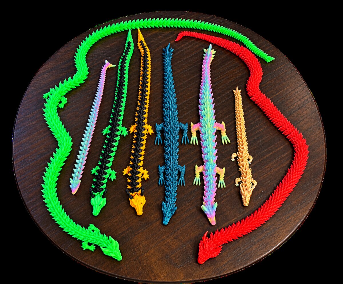 Six articulated flexi gators in a rainbow of colors
